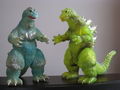 Glow-in-the-dark Godzilla 1962 (left) and translucent green Godzilla 1962 (right)