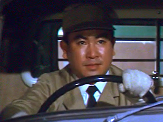 Haruya Sakamoto as a wagon driver in Dogora