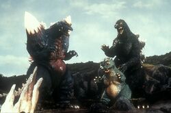 Godzilla tries to protect LittleGodzilla while fighting SpaceGodzilla (Godzilla vs. SpaceGodzilla)