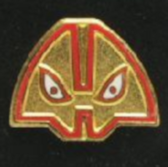 A pin of the gang's logo
