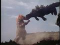 Titanosaurus picks up Godzilla with no effort