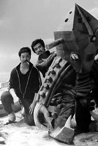 Kusumi (right) with fellow suit actor Toru Kawai