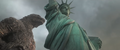 Godzilla walking past the Statue of Liberty in the first teaser trailer for Godzilla Minus Zero