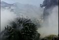 Anguirus misses and falls to the ground