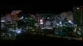 Mothra grabs Godzilla from behind while Ghidorah arrives