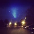"Bright lights in the sky puzzle citizens of Tennessee, USA. Color scheme consistent with Titanus Mosura's bioluminescent nature."