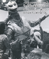 Kazunari Mori is helped into the Mechagodzilla 2 suit on the set of Terror of Mechagodzilla[1]