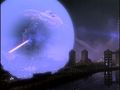 Godzilla uses his nuclear pulse to break free from Mothra's 3-D mirror