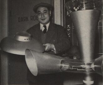 Toru Matoba with miniatures from Warning from Space