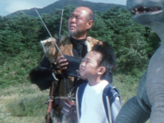 Kenta and Samon Taguchi with Minilla in Godzilla Final Wars