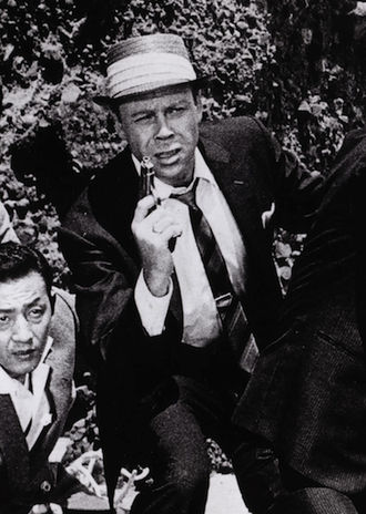 Robert Dunham as Mark Jackson in Dogora