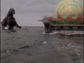 Godzilla approaches Mothra's egg