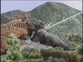 Baragon, now on the same side as the other Godzilla Island monsters, helps Godzilla battle Mecha-King Ghidorah
