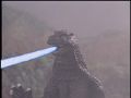 Godzilla fires his ray at King Ghidorah