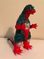 Red, green, and silver Godzilla 1964