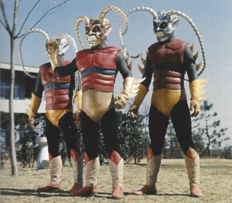 A Gold Garoga and two Silver Garogas in Zone Fighter