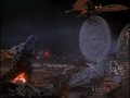 Battra grabs the Cosmo Clock 21