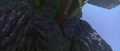 Megaguirus stabs Godzilla with her stinger