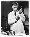 TV promotional still of Decker in the lab