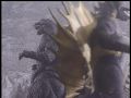 Gigan walks past Godzilla and King Caesar
