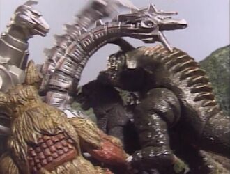 Godzilla, Mechagodzilla, King Caesar, and Baragon ganging up on Mecha-King Ghidorah