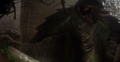 Gamera roaring in agony after Iris impales his hand
