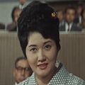 Toki Shiozawa as women's organization representative in Invasion of Astro-Monster