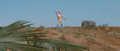 Jet Jaguar arrives on Monster Island and waves to Godzilla