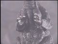 Godzilla in handcuffs