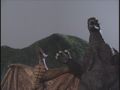 Godzilla and Rodan celebrating after the artificial sun is destroyed