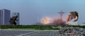 Megaguirus fires the energy she stole from Godzilla in the form of a giant fireball