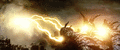 Keizer Ghidorah uses his Destroyed Thunder beams to pick up and drop Godzilla