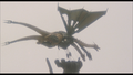 Mecha-King Ghidorah and Godzilla plummet into the ocean