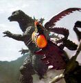 Godzilla passes by the dying Kamacuras