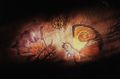 An ancient tablet that depicts Mothra fighting Battra