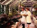 Promotional still of Decker feeding the carnivorous plants