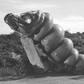 A Mothra larva prop behind the scenes of Destroy All Monsters