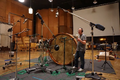 Tom Holkenborg with a drum, five feet in diameter, which he commissioned for the Godzilla vs. Kong soundtrack