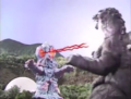 Godzilla being hit with Neo-Hedorah's eye lasers