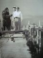 Shoichi Hirose, wearing the Kong suit, confers with Eiji Tsuburaya before filming of the kaiju's attack on Tokyo