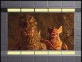 On the bases' big screen, King Caesar tells Godzilla off for napping during his meditation