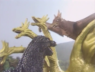Godzilla and Rodan battling King Ghidorah