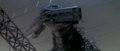 Godzilla holds a train in his mouth during his 1954 attack on Tokyo