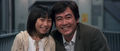 Tokumitsu Yuhara and Sara smile after Akane invites them to dinner