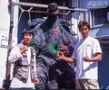 Iris suit actor Akira Ohashi and Fukuzawa next to the G3 Gamera suit