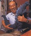 Nakajima holds a MosuGoji model