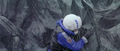 Kiriko Tsujimori grabs onto Godzilla's back
