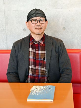 Toshio Miike at an interview