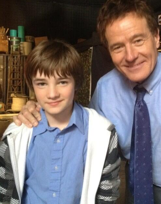 CJ Adams and Bryan Cranston in an on-set photo for Godzilla
