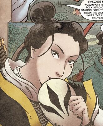 Akio unmasking herself in Godzilla: Rage Across Time #1